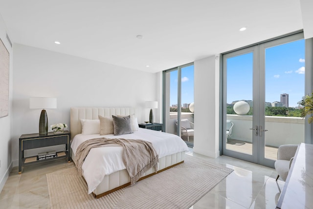 bedroom with multiple windows, french doors, access to exterior, and light tile patterned flooring