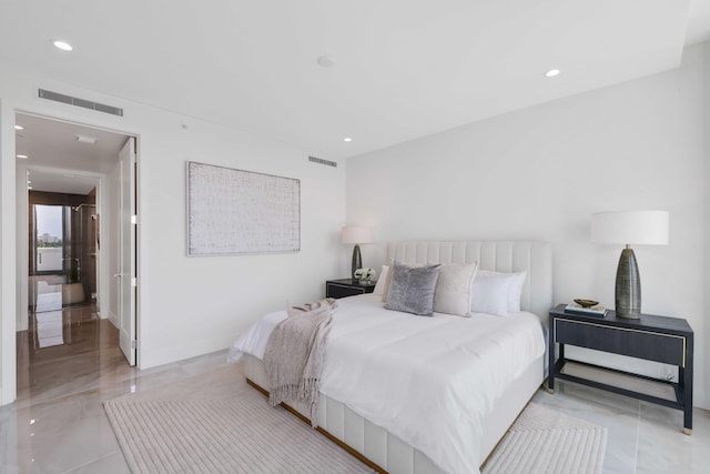 bedroom with light tile patterned flooring