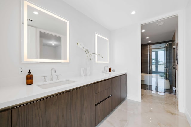 bathroom featuring double vanity and tile patterned floors