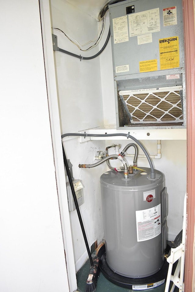 utility room with electric water heater