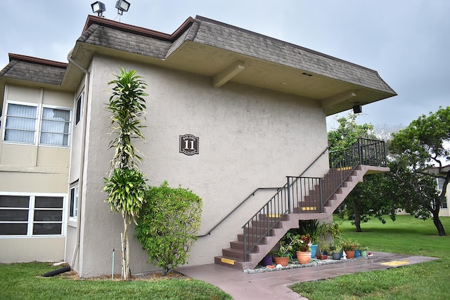 view of home's exterior featuring a yard