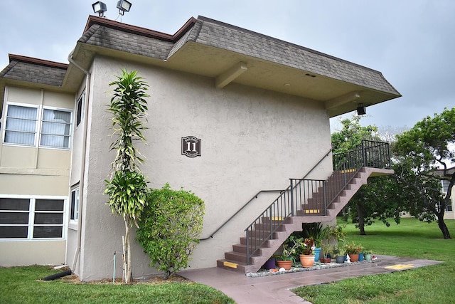 view of home's exterior with a yard