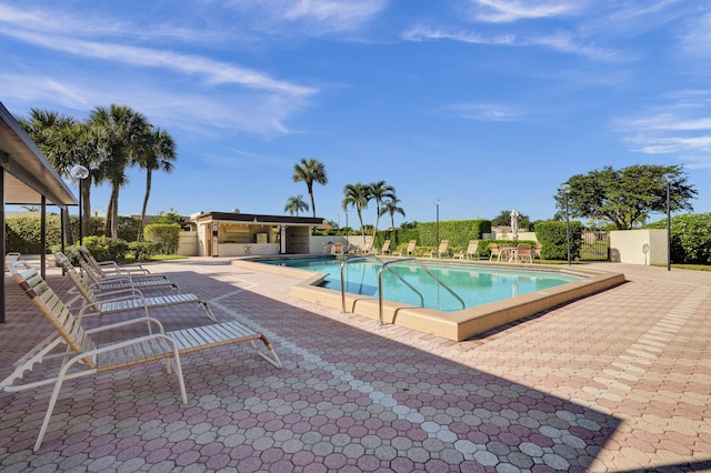 view of pool featuring a patio area