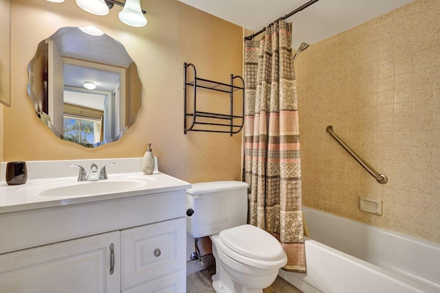 bathroom with toilet, shower / tub combo with curtain, and vanity