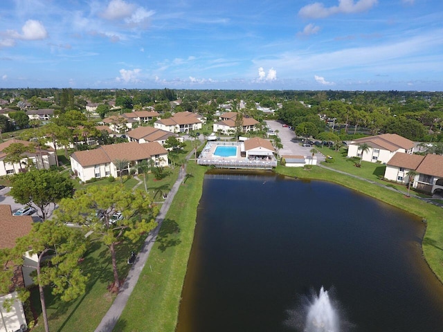 aerial view with a water view and a residential view