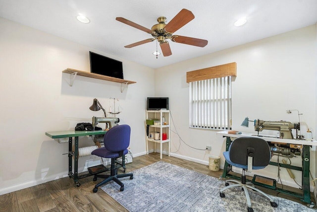 office space featuring a ceiling fan, baseboards, wood finished floors, and recessed lighting