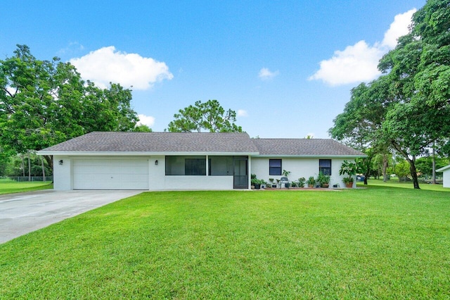 ranch-style home with a front yard and a garage