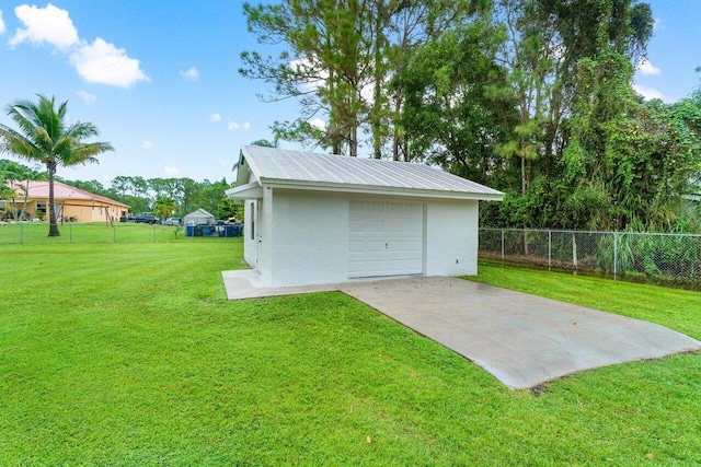 garage with a lawn