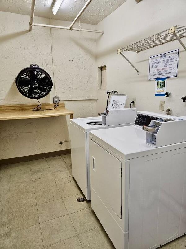 laundry room with separate washer and dryer