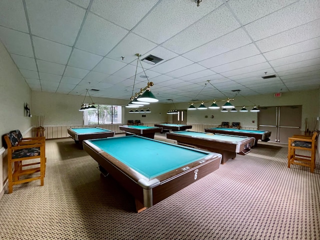 recreation room with a paneled ceiling, carpet, and billiards