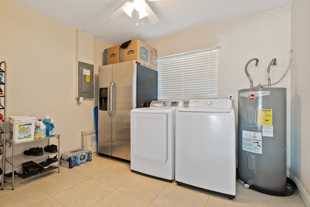 laundry area with electric water heater, electric panel, separate washer and dryer, and light tile patterned floors