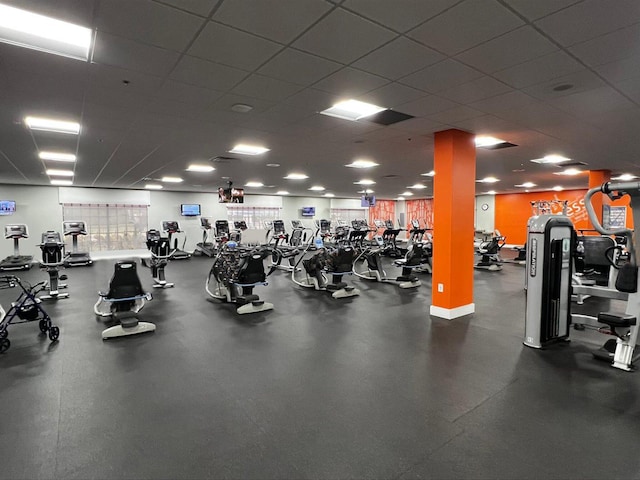 workout area featuring a drop ceiling