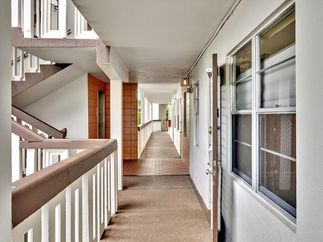 hall featuring carpet floors