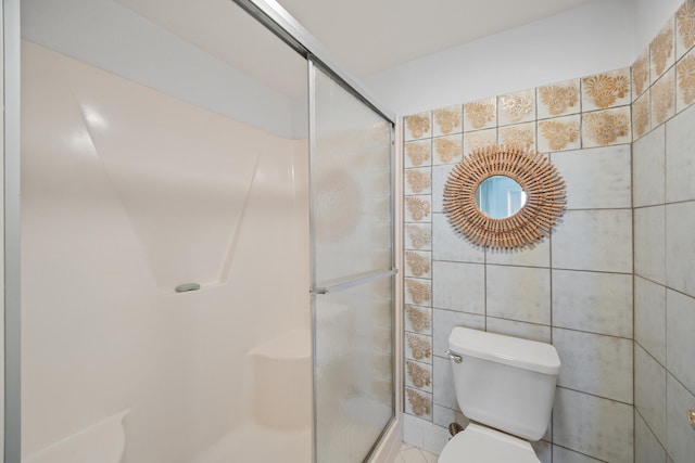 2400 S Ocean Dr Unit 124, Fort Pierce, FL 34949 - full bath with toilet, tile walls, and a shower stall