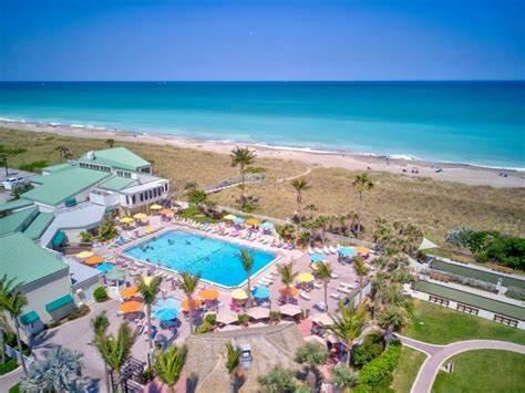 aerial view featuring a beach view and a water view