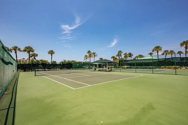 2400 S Ocean Dr Unit 124, Fort Pierce, FL 34949 - view of tennis court with fence