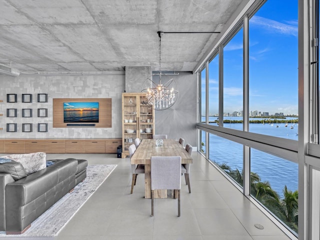 unfurnished dining area with a wall of windows and a notable chandelier