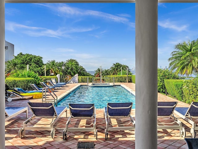 pool featuring a patio area