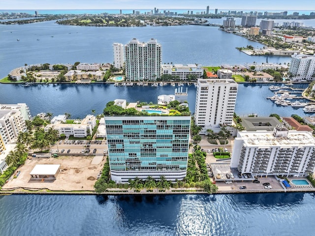 drone / aerial view with a water view and a city view