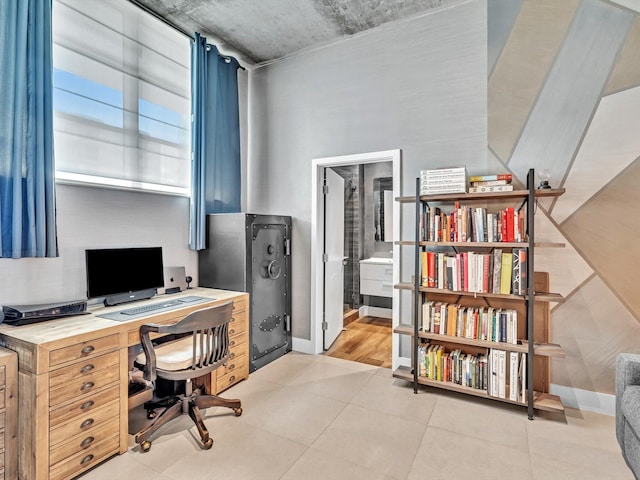 office with light tile patterned floors