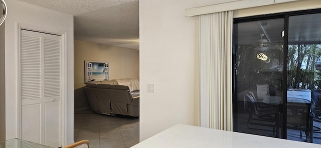 interior space featuring a closet and a textured ceiling