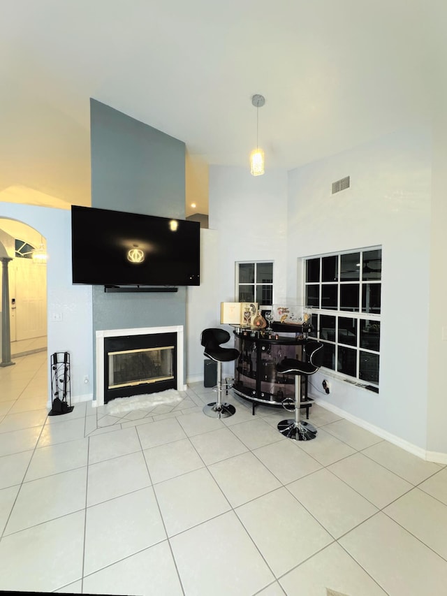 living room with tile patterned floors