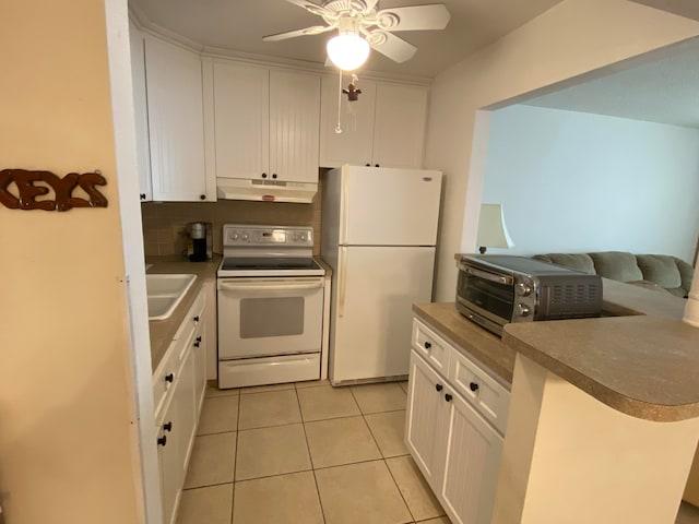 kitchen featuring backsplash, white cabinets, white appliances, ceiling fan, and light tile patterned flooring