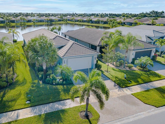 drone / aerial view with a water view