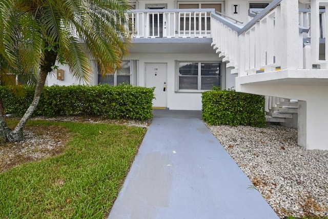 entrance to property with a balcony