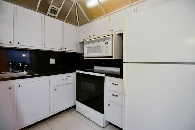 kitchen with decorative backsplash, white cabinetry, sink, white appliances, and light tile patterned flooring