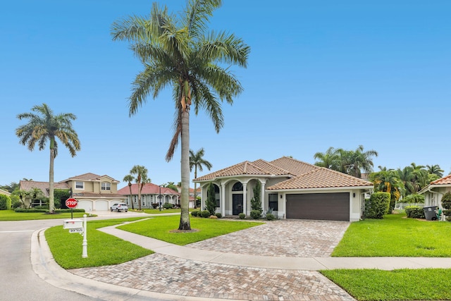 mediterranean / spanish-style home featuring a front yard