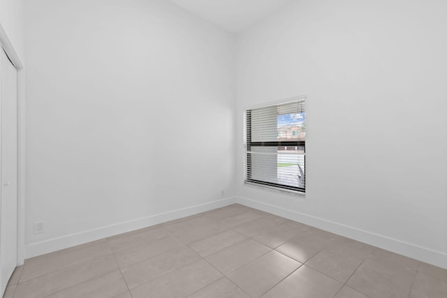 empty room featuring light tile patterned floors