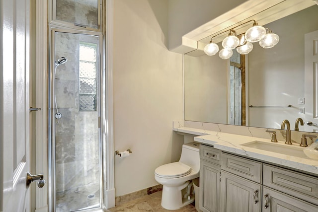 bathroom with an enclosed shower, toilet, vanity, and tile patterned floors