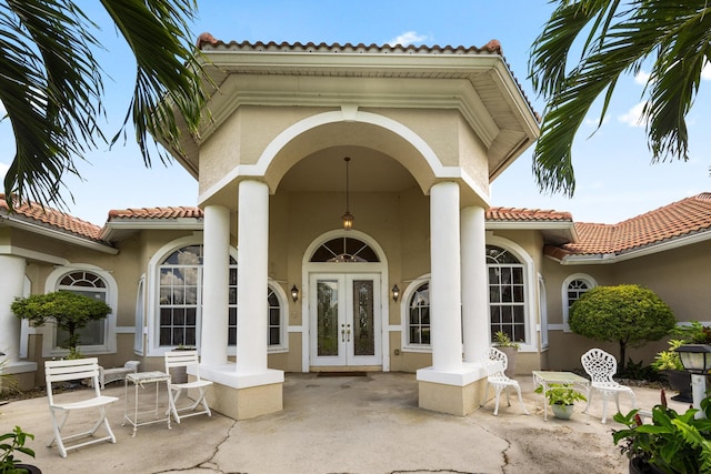 exterior space with french doors and a patio