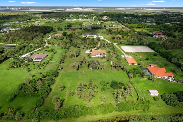 birds eye view of property featuring a rural view