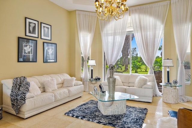 living room featuring a notable chandelier