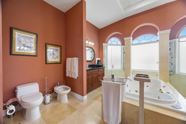 bathroom featuring a bidet, a relaxing tiled tub, plenty of natural light, and toilet