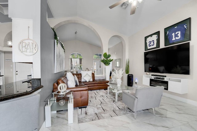 living room with french doors, vaulted ceiling, and ceiling fan