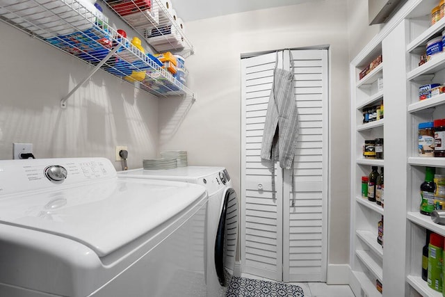 laundry area featuring separate washer and dryer