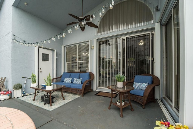 view of patio with ceiling fan and an outdoor hangout area