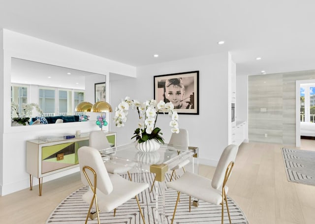 dining space featuring light hardwood / wood-style floors