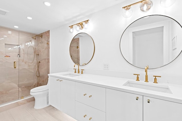 bathroom with toilet, an enclosed shower, vanity, and tile patterned flooring