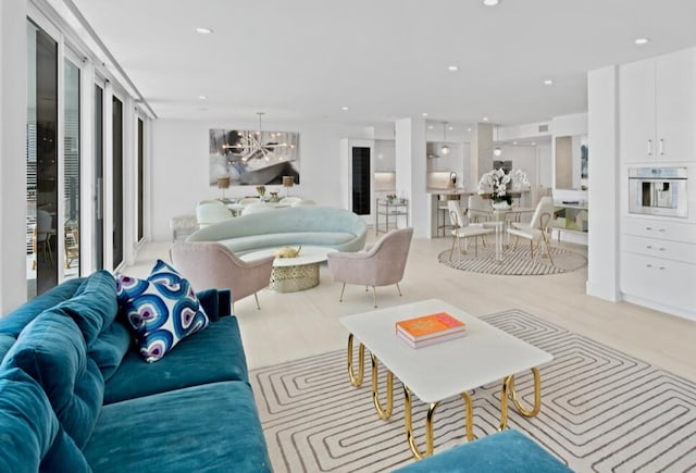 living room featuring a chandelier