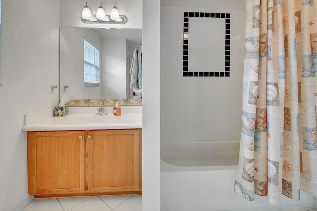 bathroom with shower / tub combo with curtain, tile patterned floors, and vanity