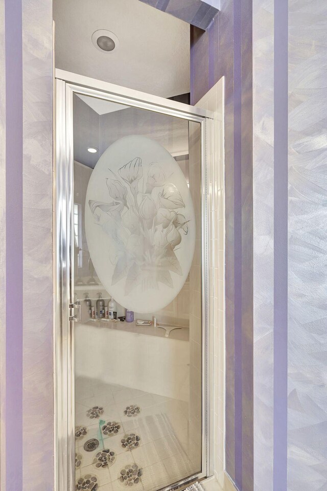 bathroom featuring an enclosed shower