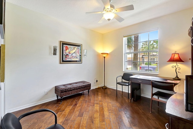 living area featuring a textured ceiling, ceiling fan, and dark hardwood / wood-style floors