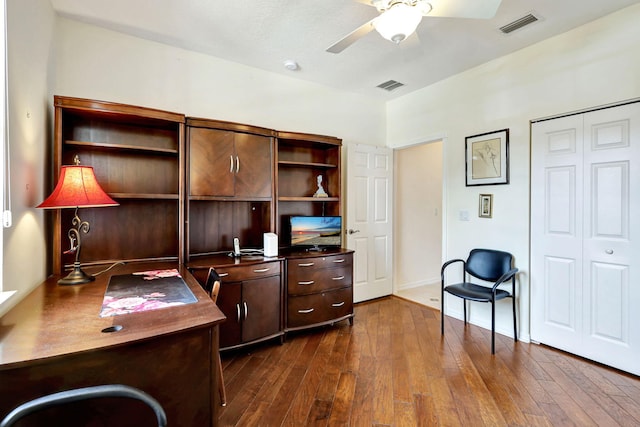 office space with ceiling fan and dark hardwood / wood-style flooring