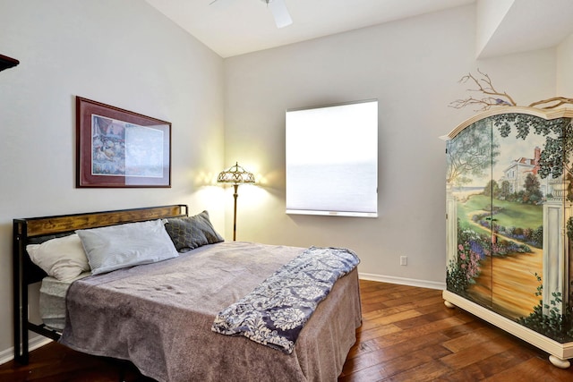 bedroom featuring vaulted ceiling, ceiling fan, and dark hardwood / wood-style floors