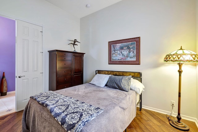 bedroom featuring hardwood / wood-style flooring