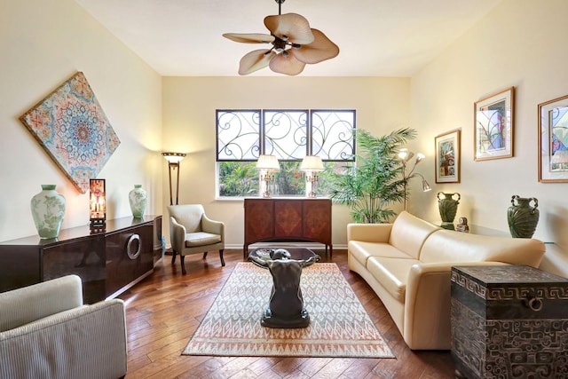 interior space with dark wood-type flooring and ceiling fan